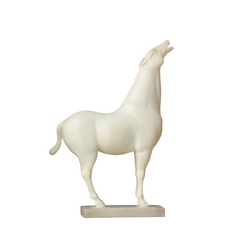 White horse statue on a white background