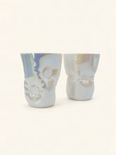 Yifan Renxu Studio ceramic pillow cup with a smooth, rounded shape and decorative design, ideal for holding beverages or display.