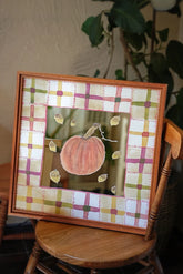 Autumn pumpkins mirror wall art featuring a decorative design with pumpkin motifs and a reflective surface, ideal for fall decor.