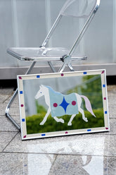 Bauhaus-style pony mirror wall art by TRLab Shop featuring geometric design and sleek modern aesthetics.