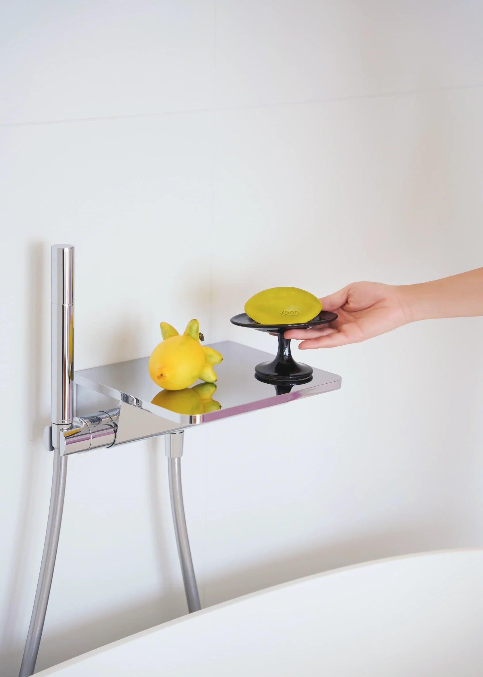 YRGD scented soap with floral and citrus accents, showing a bar with intricate design and vibrant packaging.