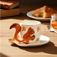 Squirrel ceramic coffee cup and saucer set featuring a detailed squirrel design, perfect for coffee or tea serving.