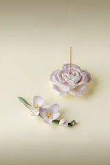 Handcrafted Magnolia incense holder from TRLab Shop, featuring a detailed ceramic design with a hollowed center for holding incense sticks.