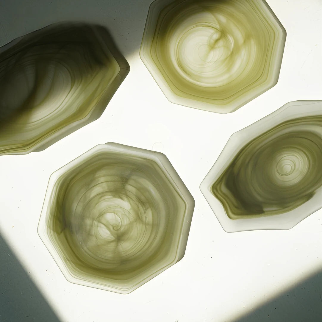 Green octagonal matte glass plate with smooth edges, ideal for serving or decorative display, by TRLab Shop.
