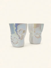 Yifan Renxu Studio ceramic pillow cup with a smooth, rounded shape and decorative design, ideal for holding beverages or display.