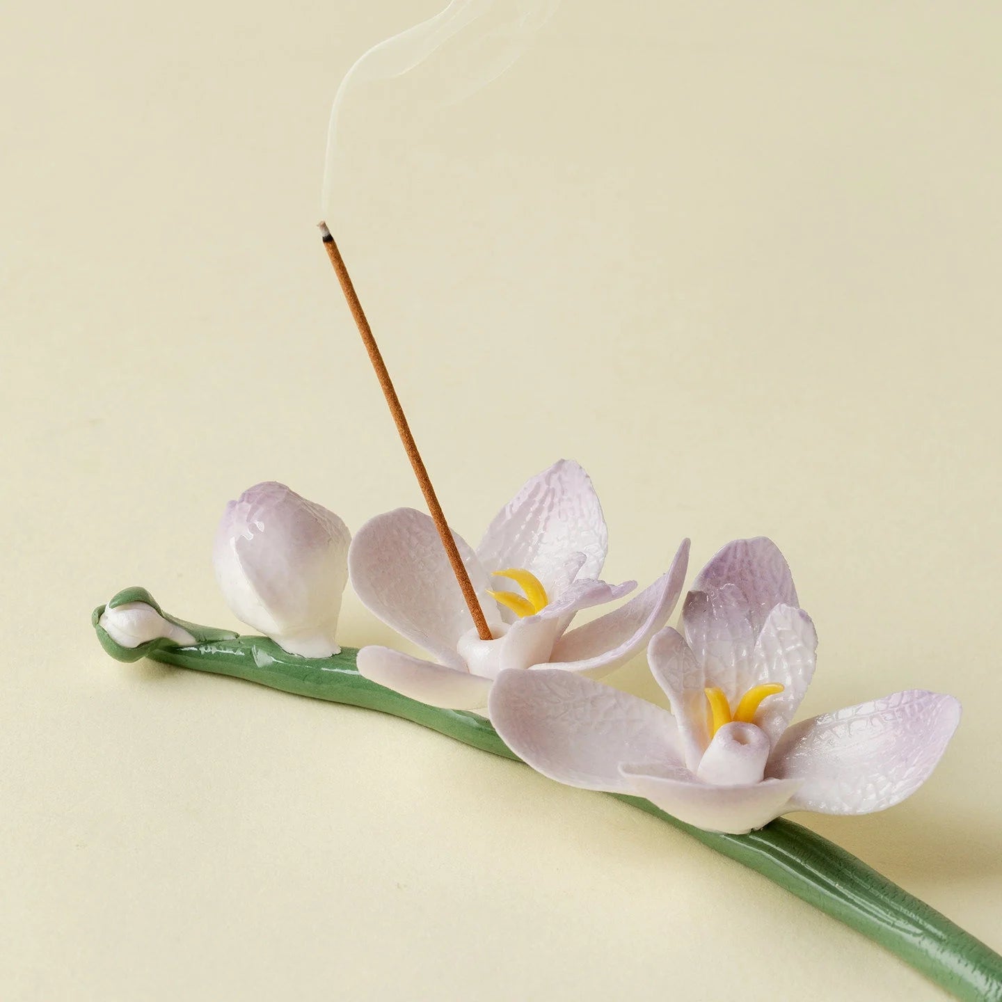 Handcrafted Magnolia incense holder featuring a decorative design, perfect for holding incense sticks and enhancing home ambiance.