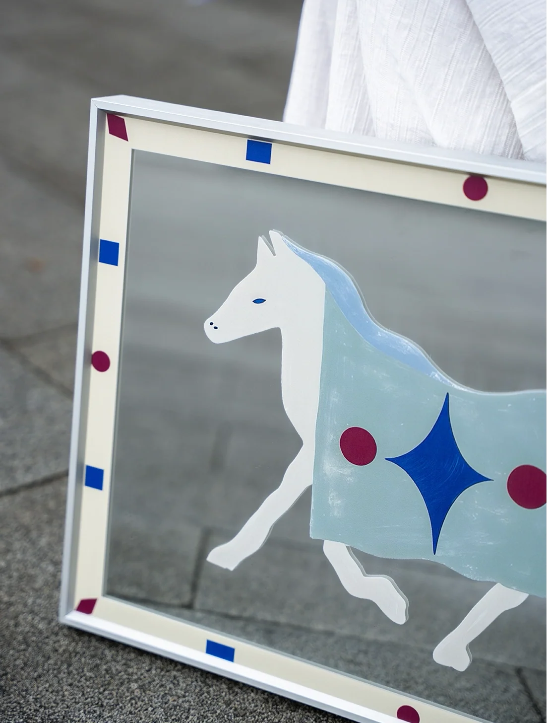 Bauhaus-style pony mirror wall art featuring geometric design and sleek black frame, suitable for modern home decor.