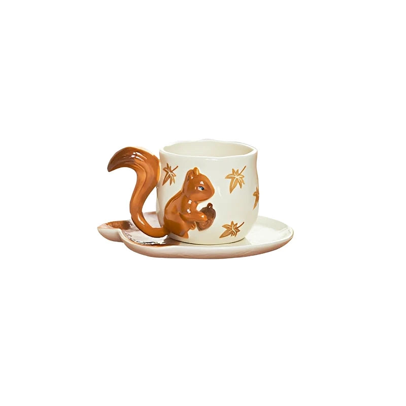 Squirrel ceramic coffee cup and saucer set with detailed squirrel design, ideal for serving hot beverages in a charming style.