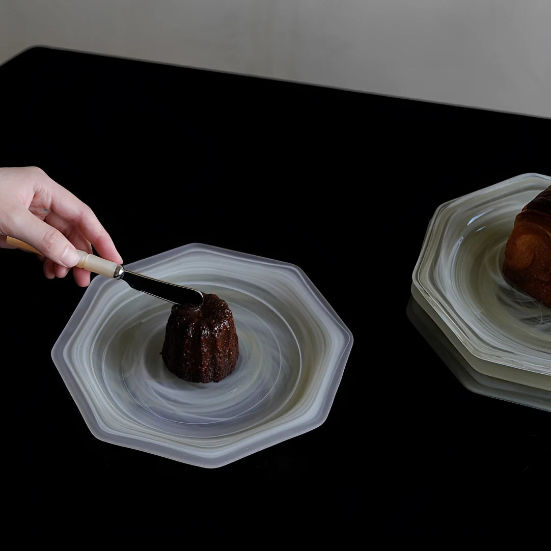 Green octagonal matte glass plate with a smooth surface, perfect for serving or decorative display.