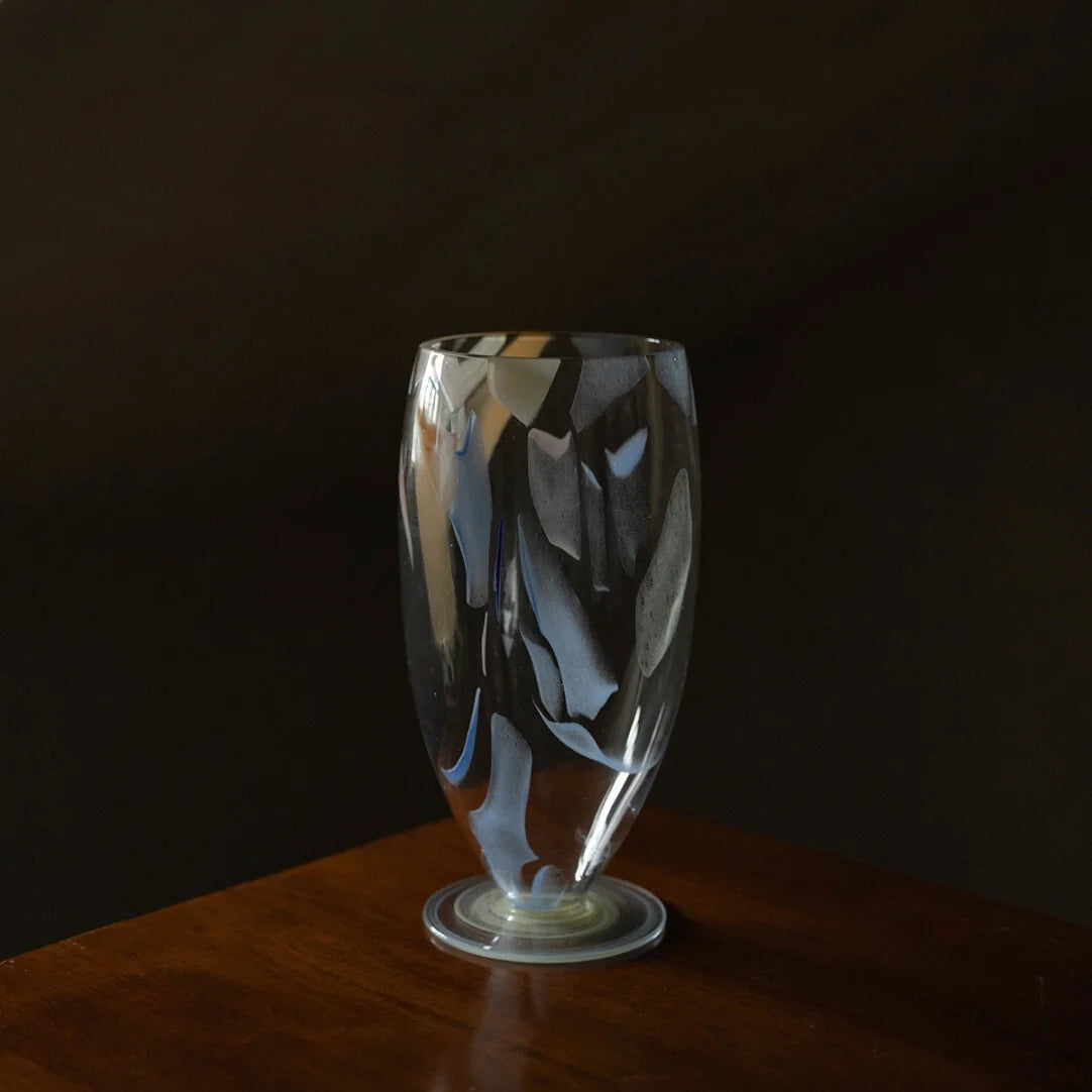 Luminous Fragment Glass Vase by TRLab Shop with textured, glowing glass surface, perfect for decorative floral arrangements.