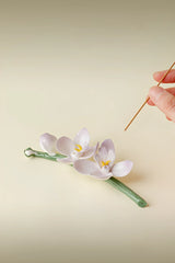 Handcrafted Magnolia incense holder from TRLab Shop, featuring a detailed ceramic design for holding incense sticks.