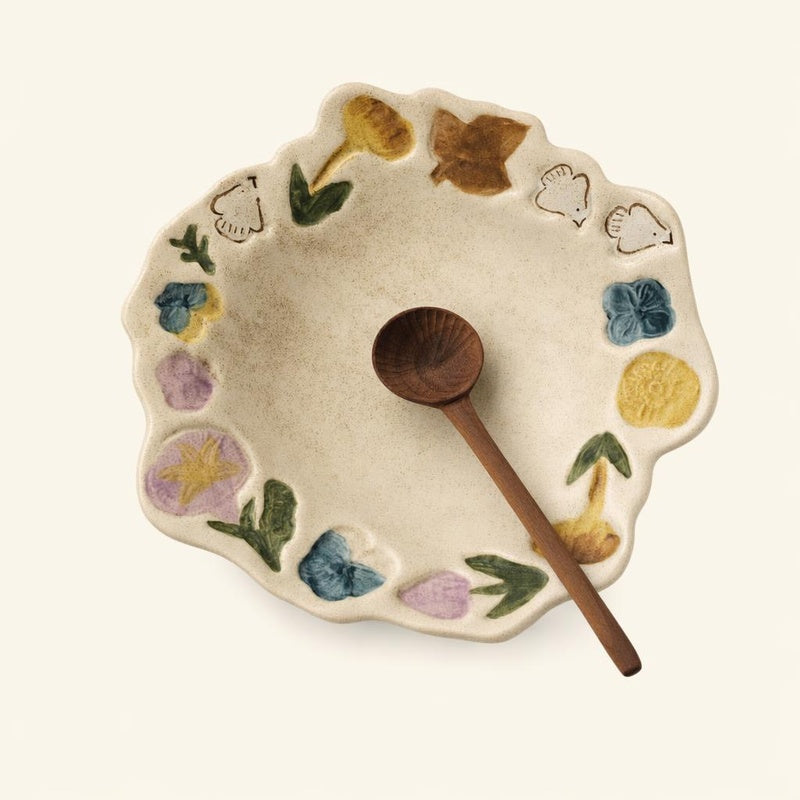 Hand-pinched ceramic plate featuring floral and bird motifs, crafted in coarse pottery by TRLab Shop.