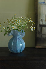 Round-bellied glass vase by TRLab Shop featuring a clear, smooth, rounded design ideal for floral arrangements.