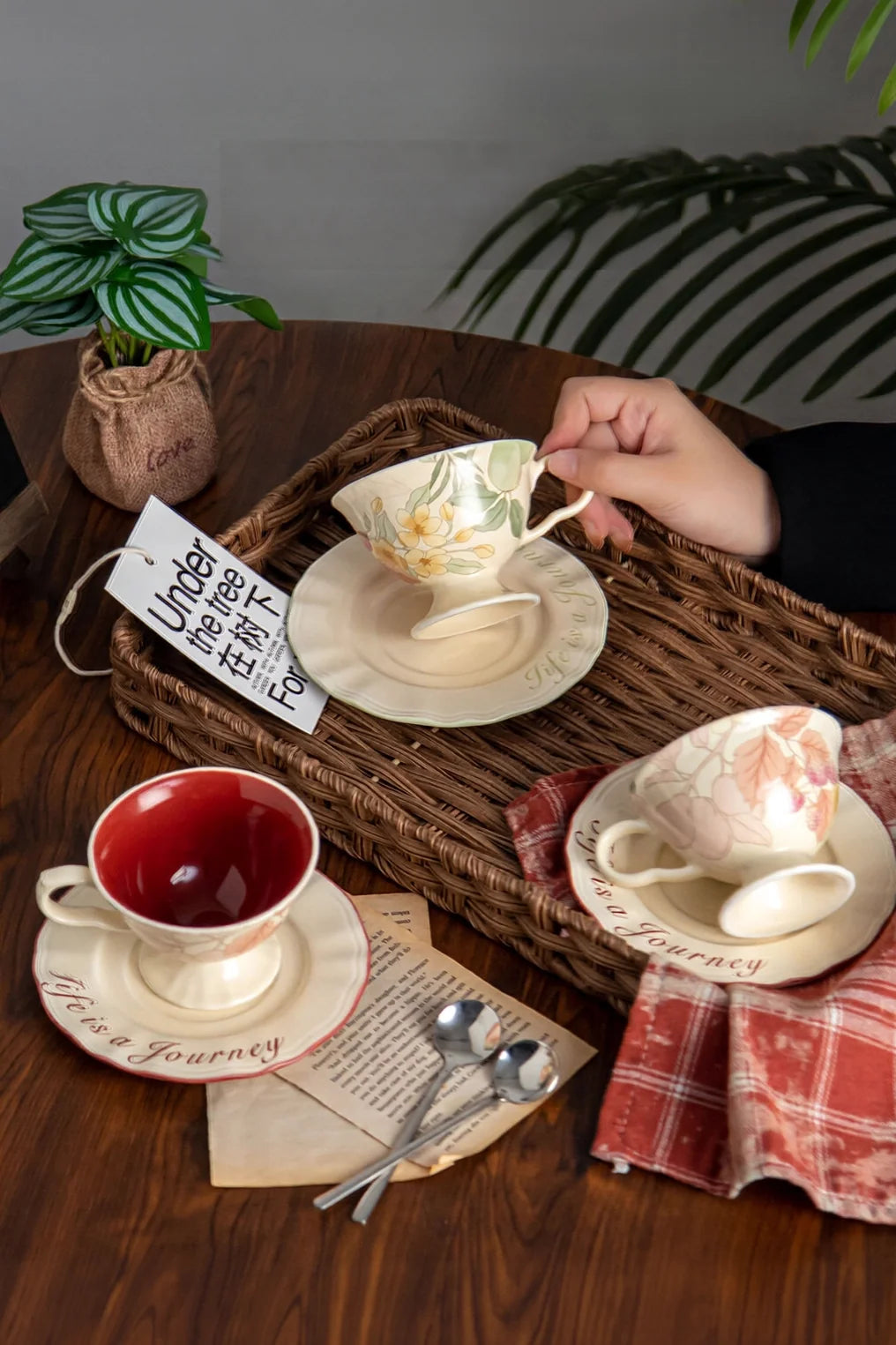 Ceramic coffee cup and saucer set with floral and fruit pattern by TRLab Shop, featuring colorful botanical design.