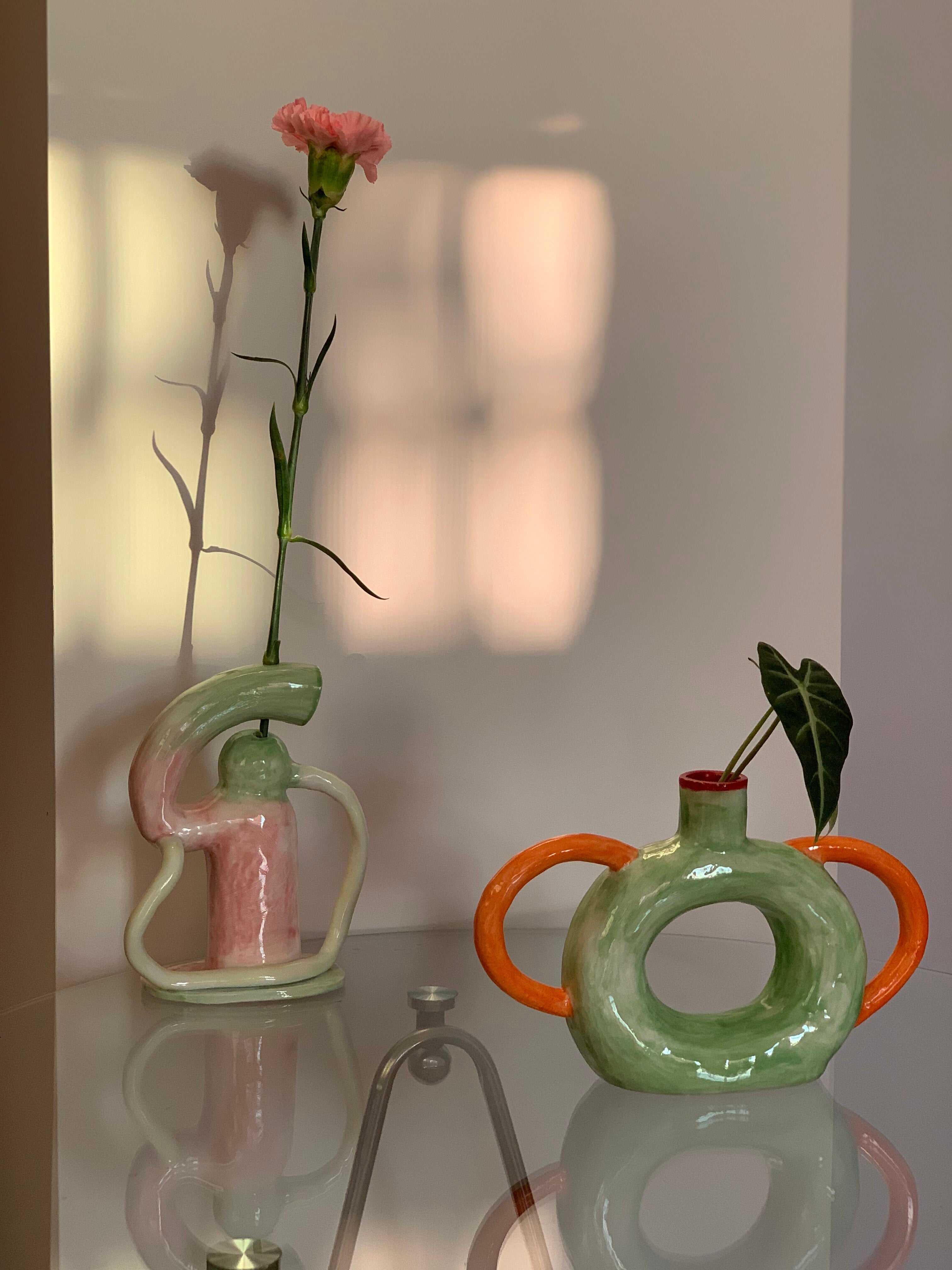 UNBELDI ceramic multi-geometric vase from the collection, featuring a modern design with colorful geometric patterns.