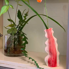 Ceramic cactus-shaped vase from UNBELDI collection, beige with green cactus design, smooth finish and rounded shape.
