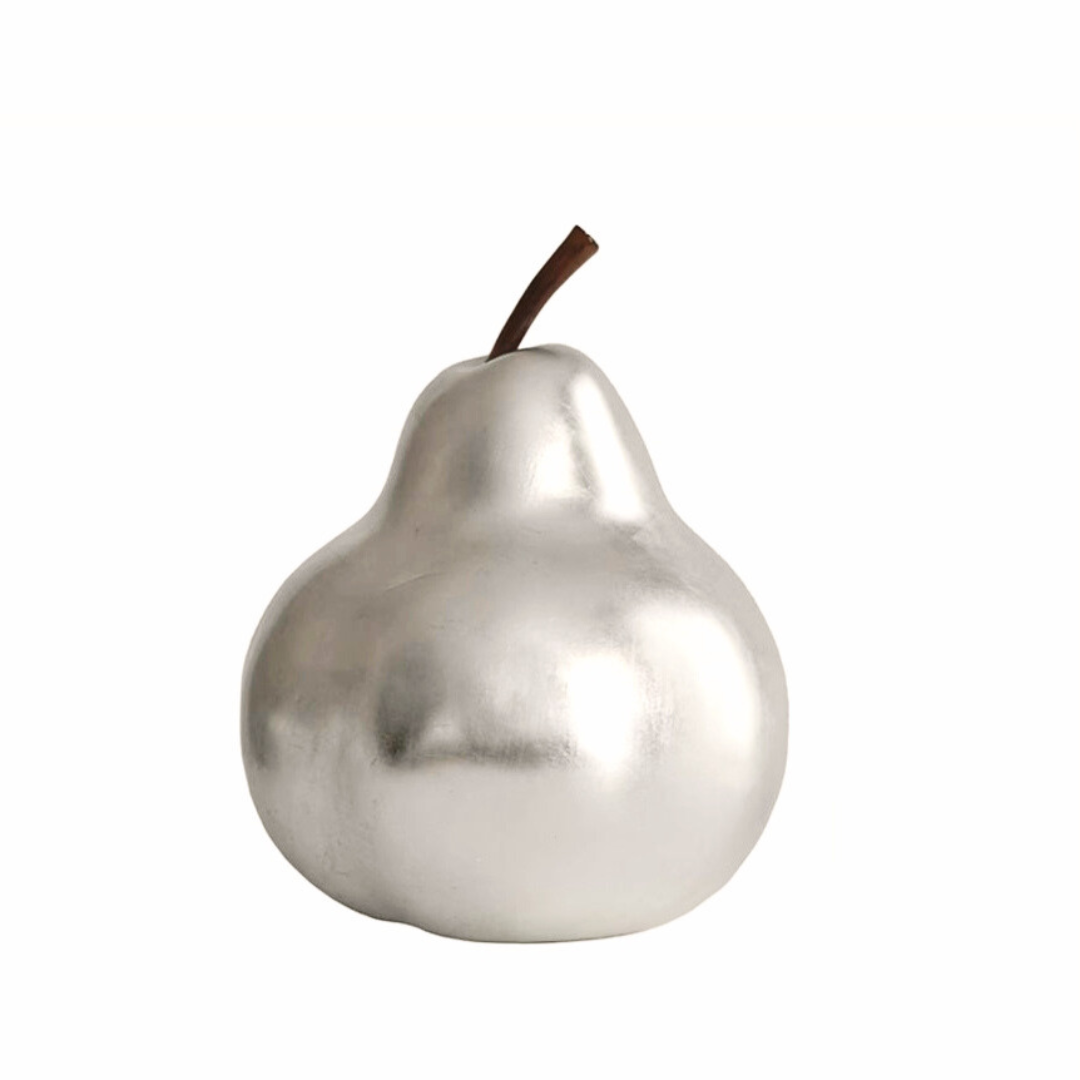 A silver-colored, hand-carved fiberglass sculpture resembling a pear with a smooth, metallic finish.