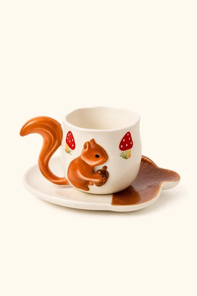 Squirrel ceramic coffee cup with matching saucer set, featuring a detailed squirrel design, ideal for cozy coffee moments.