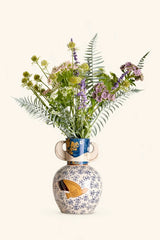 Twin-handled Dove ceramic vase with smooth white finish, featuring elegant curved handles and a sleek design perfect for home decor.