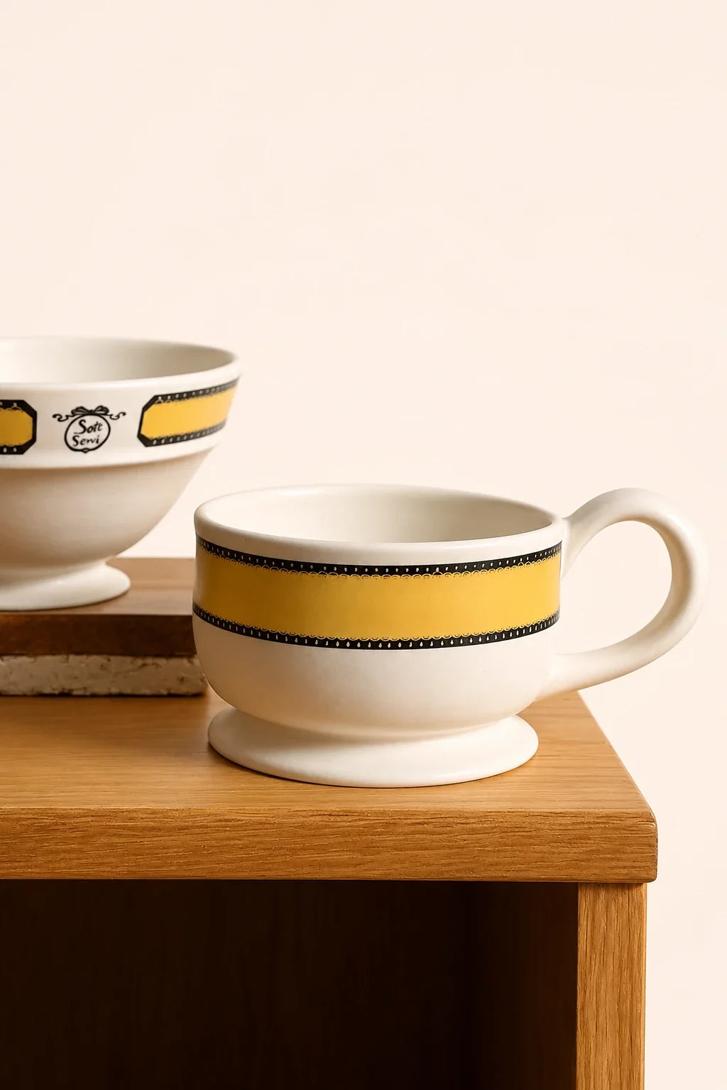 SoftServe Buttercream Ribbon ceramic mug featuring a smooth, glossy finish with elegant ribbon design on the side.