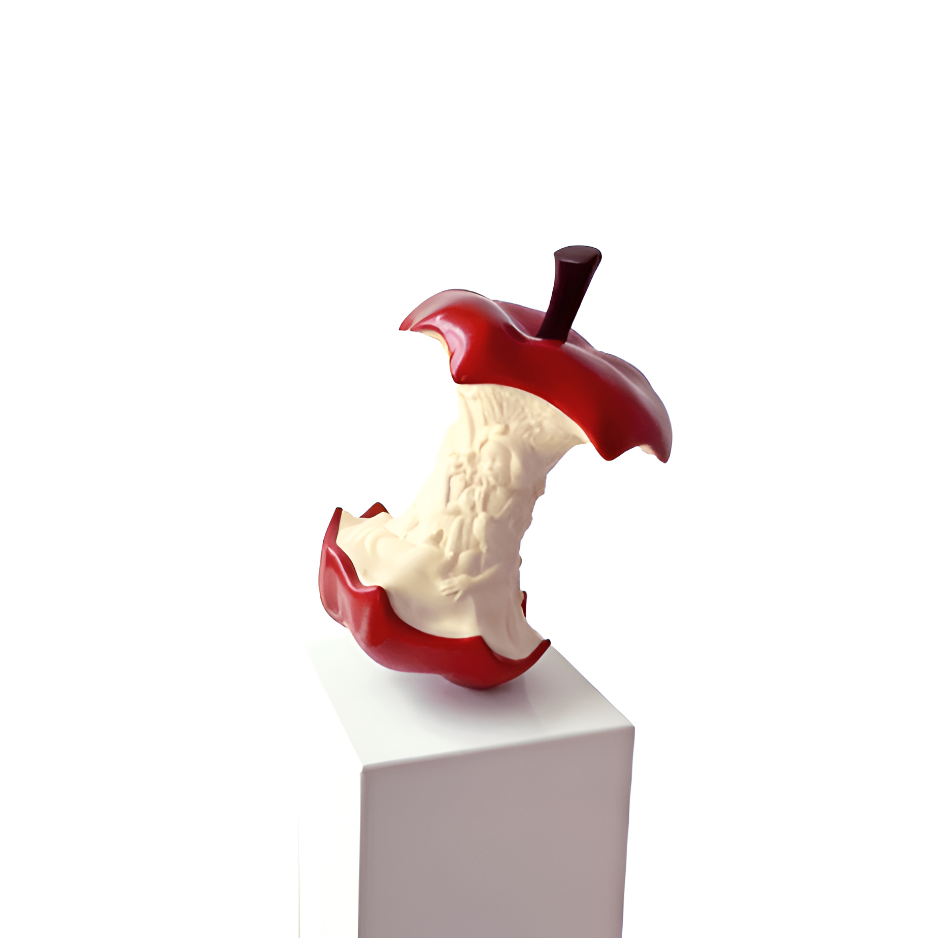 A hand-carved fiberglass apple sculpture mounted on a white oakwood stand, with a detachable red half visible in the image.