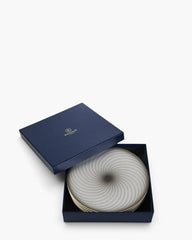 Raynaud Oskar set of 4 dessert plates with gift box in Limoges porcelain featuring 4 different designs - Buy now on ShopDecor - Discover the best products by RAYNAUD design